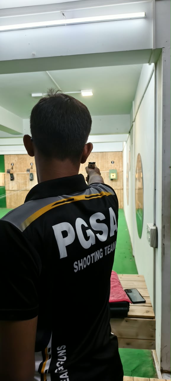PGSA shooter aiming an air pistol at the range